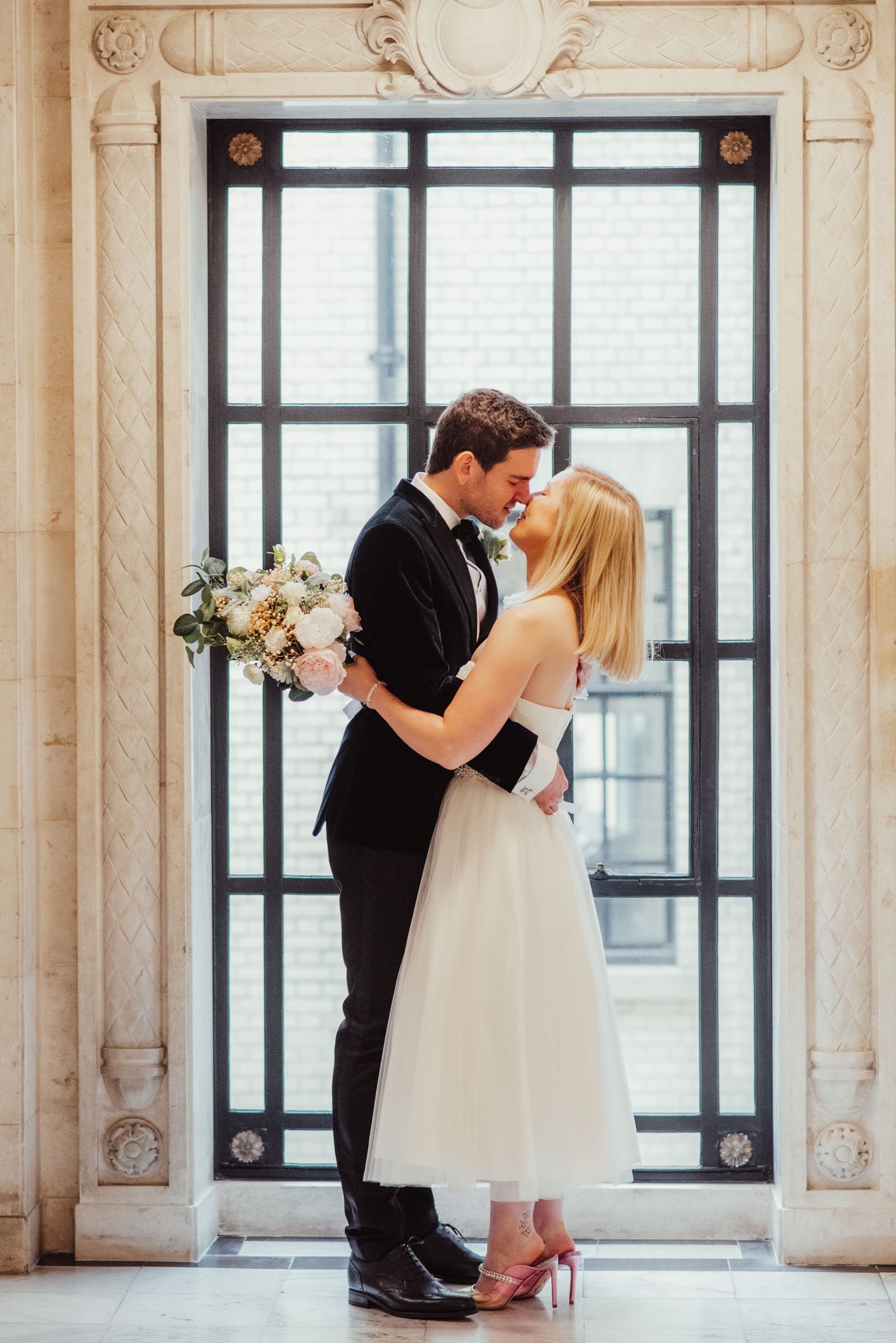 Newly Married couple getting married at the old marylebone town hall london 
