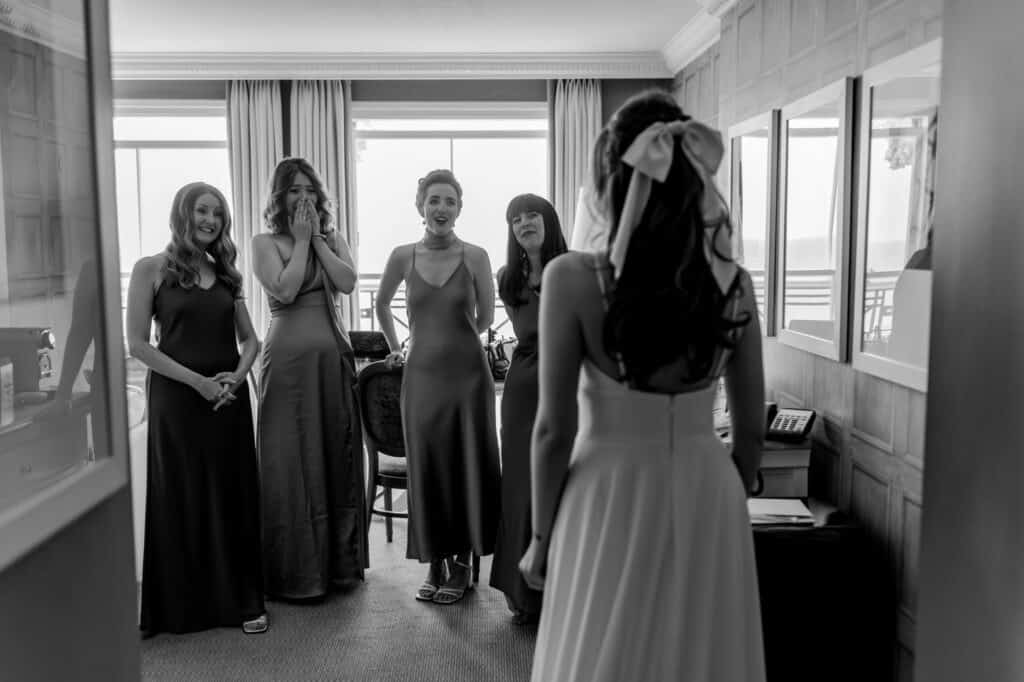 Amazing bride and bridesmaids shared a heartfelt moment before the wedding.