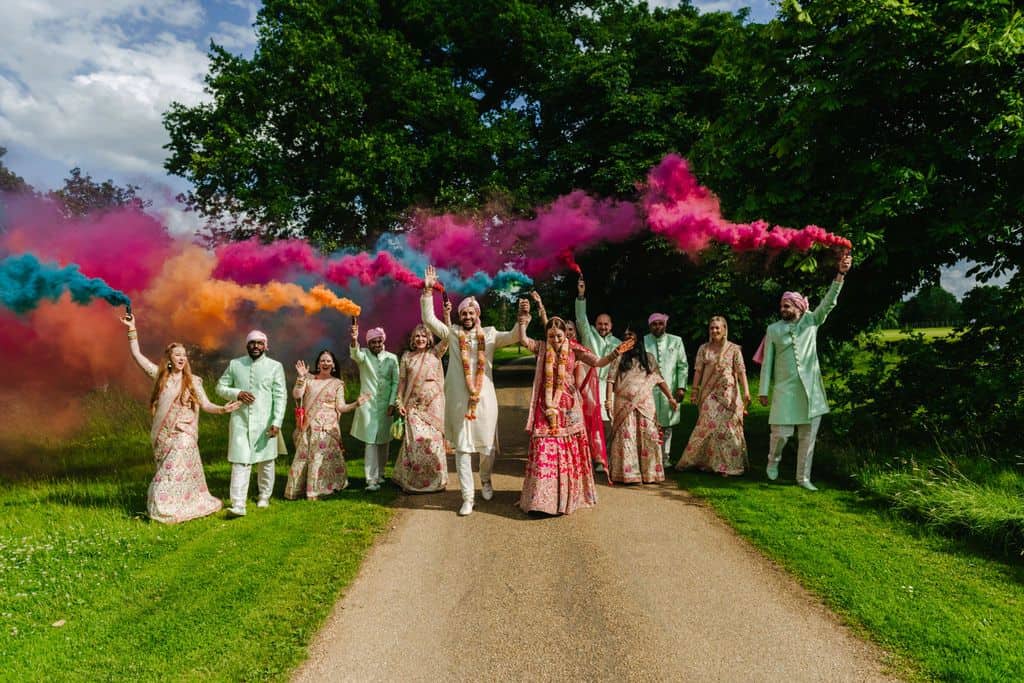 Hindu wedding party with smoke bombs